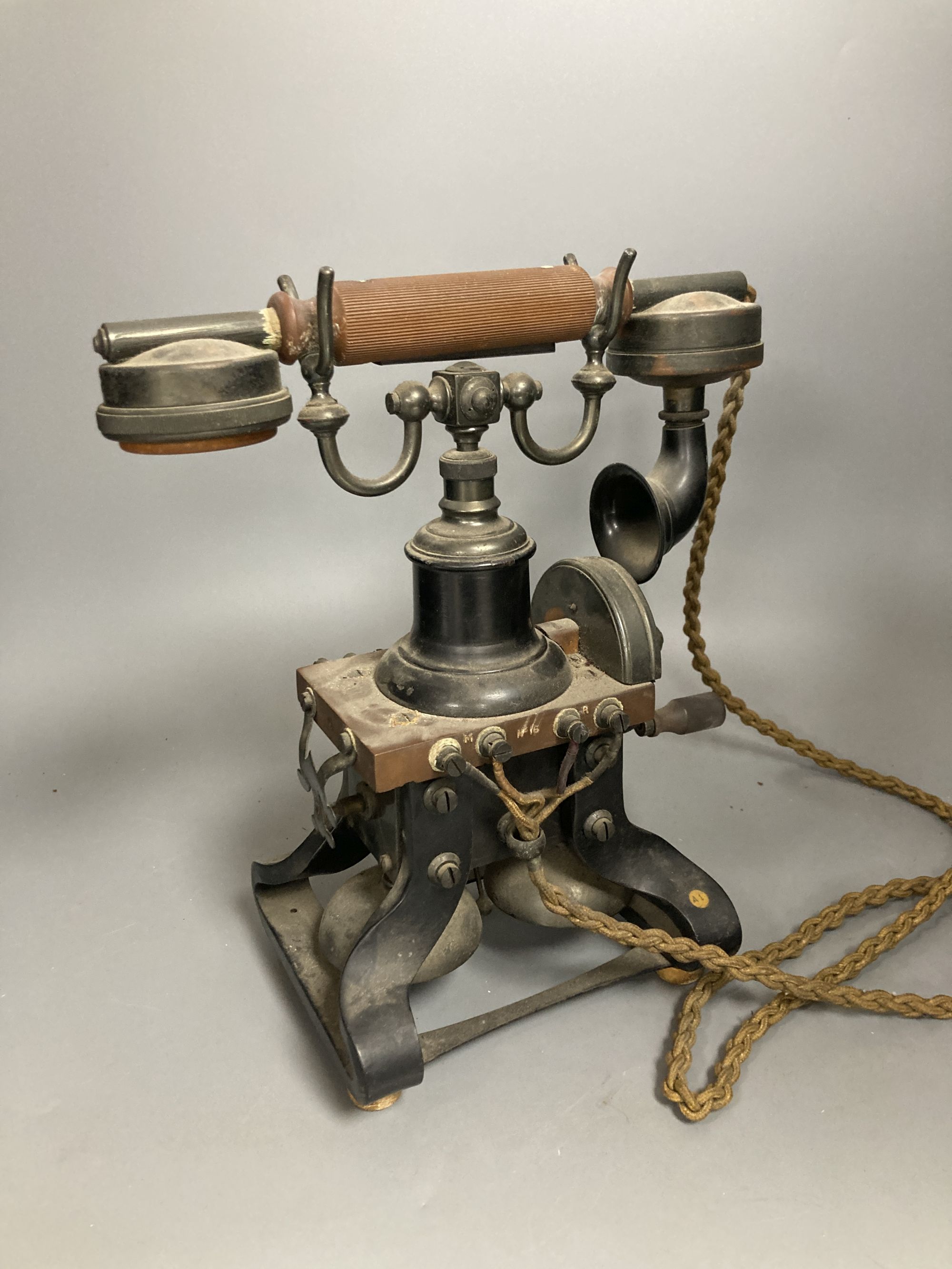 A late 19th / early 20th century Ericsson No. 16 telephone, the earpiece marked s-25 / 237 G.P.O.Nc28, 30cm high.